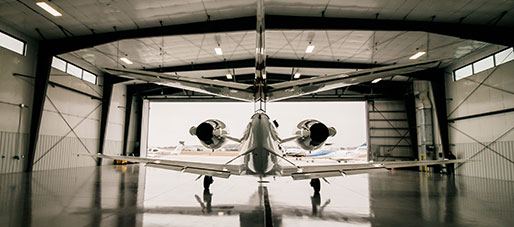 private plane inside of hangar